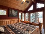 Master Bedroom with a Queen Bed and fabulous views of Ashley Lake